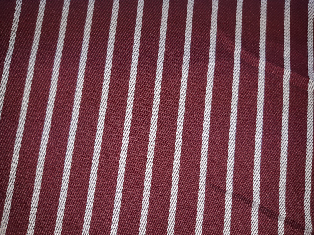 YARD ⚜  
11380 ⚜  
C8 ⚜  
PANTONE: No pantone color assigned ⚜  
bordeaux gabardine twill fabric with wide white stripes, 65 % cotton 35 % polyester